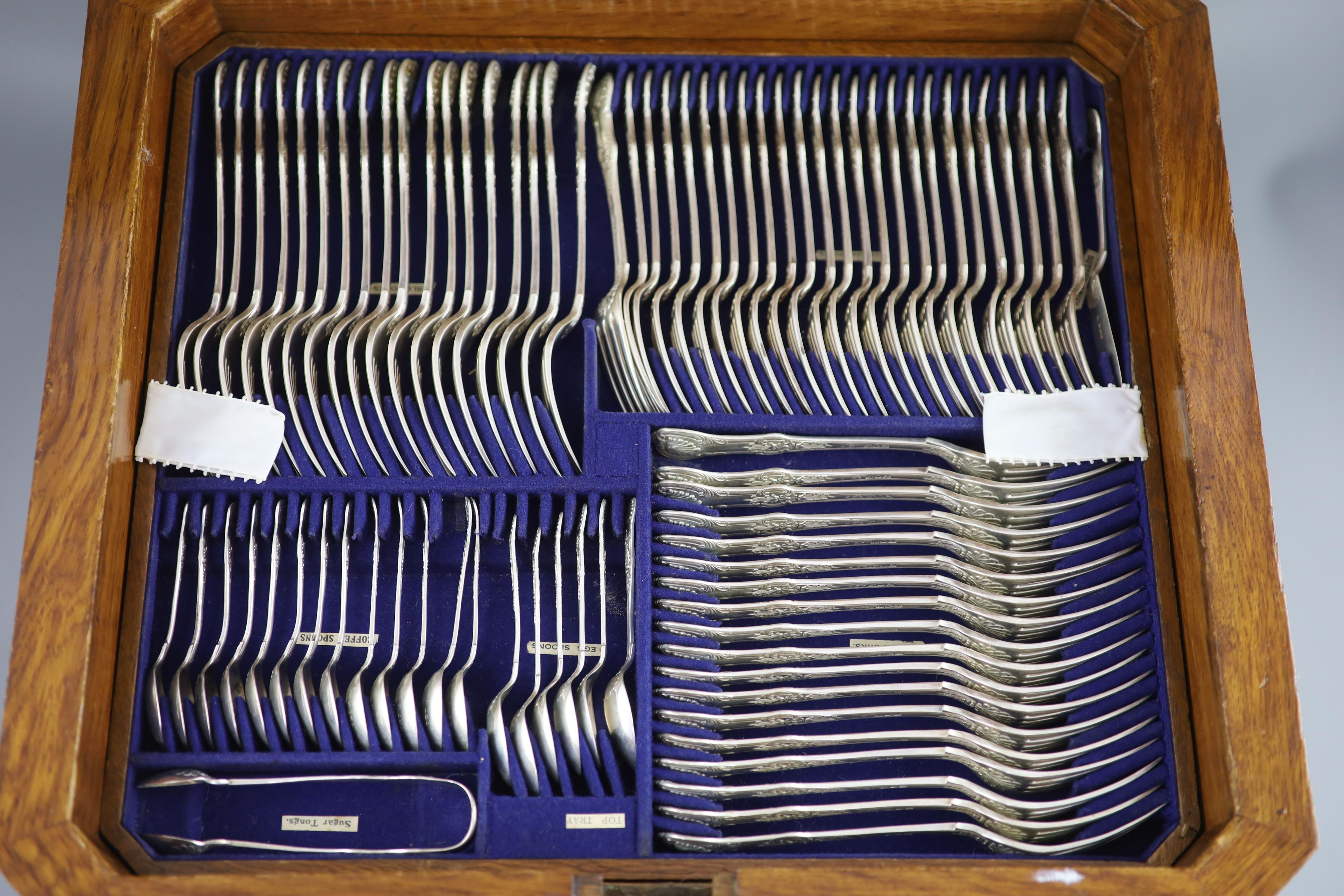 A part canteen of late Victorian silver double struck Queens pattern cutlery by Carrington & Co